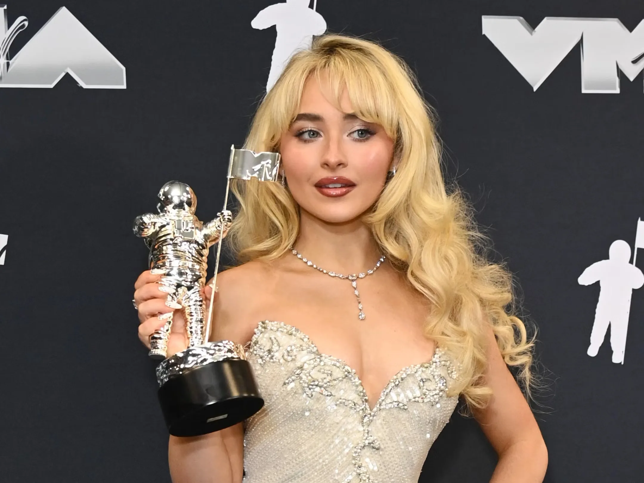 Sabrina Carpenter Pays Homage to Madonna at the 2024 MTV VMAs in Vintage Oscars Gown