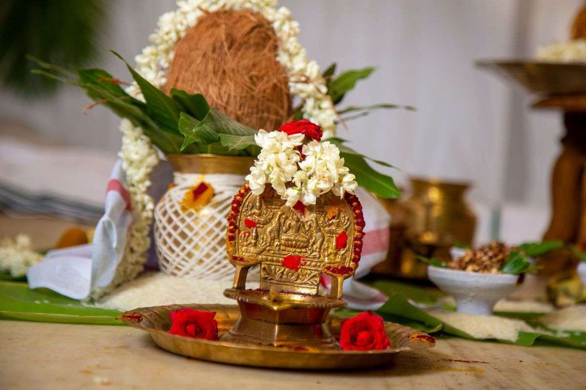 Fresh flowers and incense in a puja room