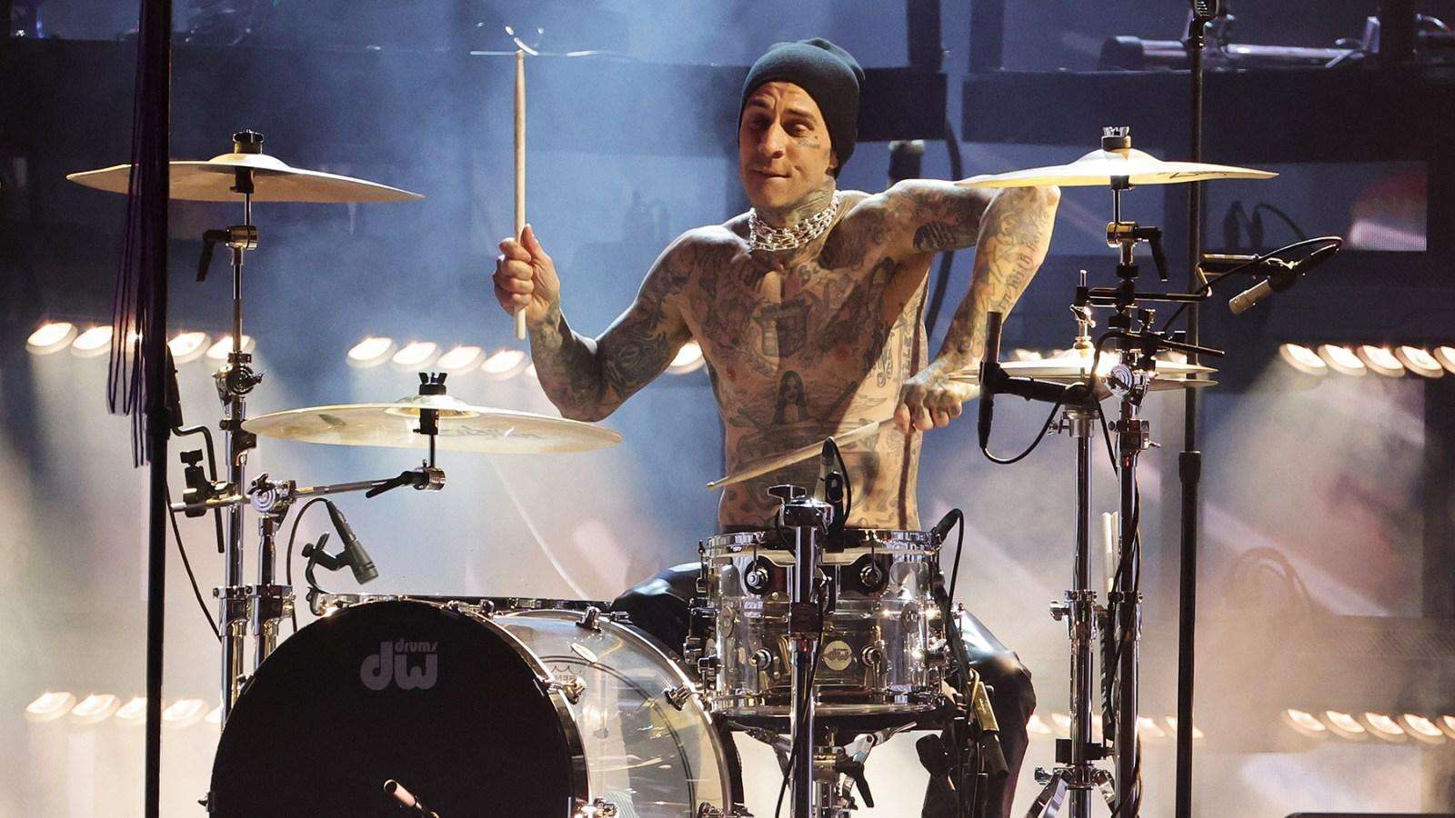 Travis Barker made an electrifying appearance on Kai Cenat’s Twitch stream, “Mafiathon 2,” surprising the streamer with a 13-minute drum solo while he slept.