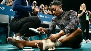 Simone Biles Injures Leg in Olympic Qualifying but Still Finishes 1st